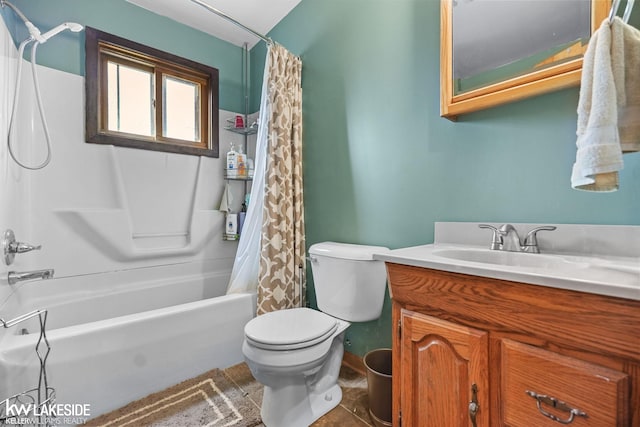 bathroom with shower / tub combo with curtain, toilet, vanity, and tile patterned floors