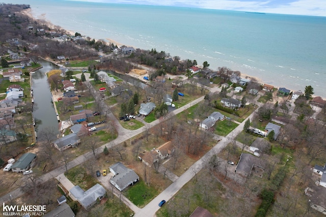 aerial view featuring a residential view and a water view