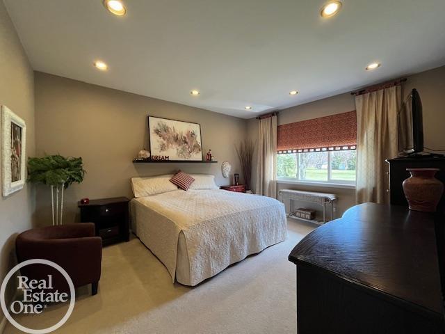 bedroom featuring carpet floors and recessed lighting
