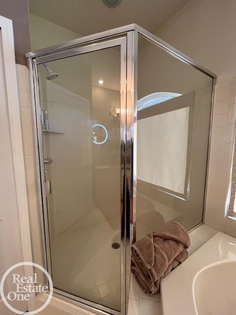 bathroom with a stall shower