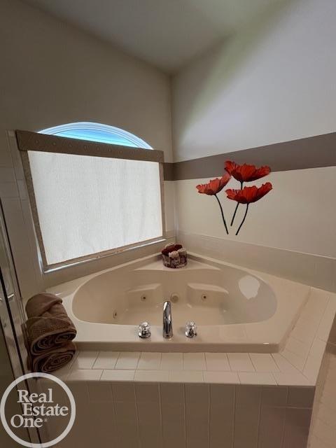 bathroom featuring a whirlpool tub