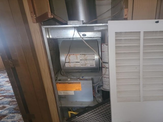 utility room featuring a heating unit