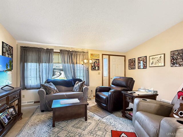 2709 W 6th Ave, Gladstone, MI 49837 - living room featuring carpet floors, lofted ceiling, and a textured ceiling