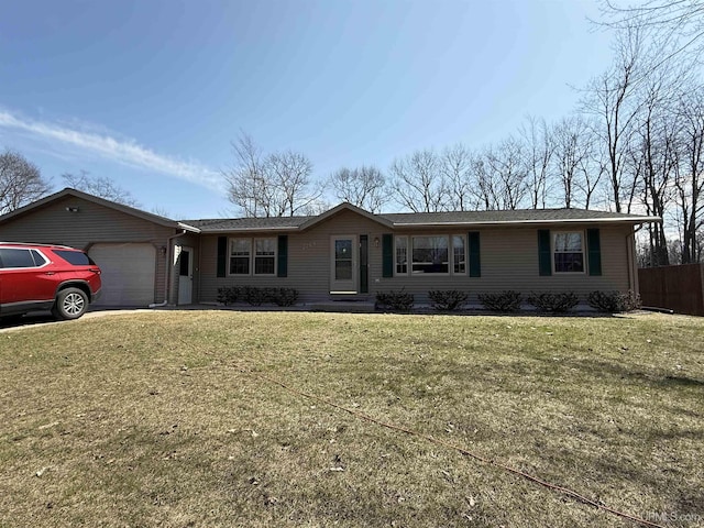 2709 W 6th Ave, Gladstone, MI 49837 - single story home with fence, a front yard, and a garage