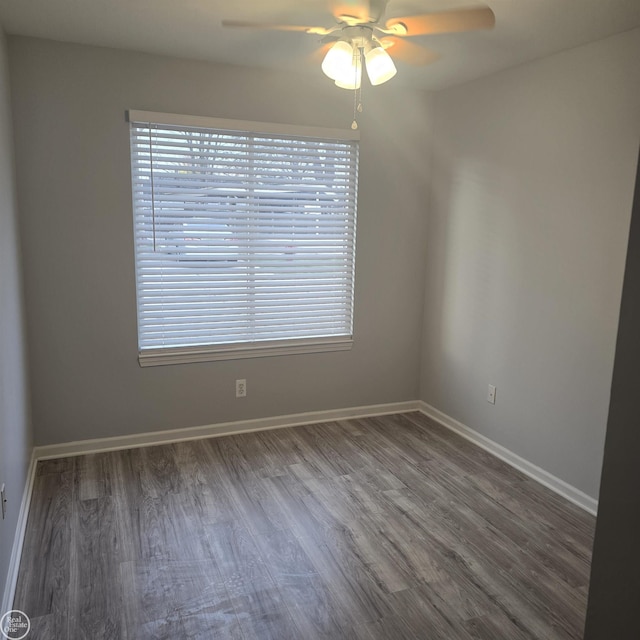 30288 Wedgewood Cir, Roseville, MI 48066 - empty room featuring baseboards, a ceiling fan, and wood finished floors