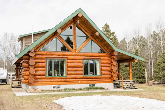 view of side of property featuring log exterior