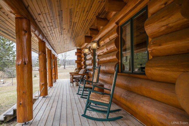deck with covered porch
