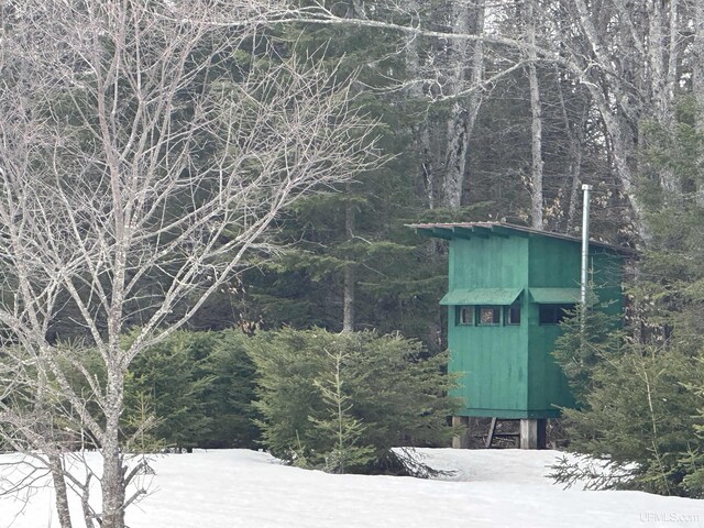 details featuring a view of trees