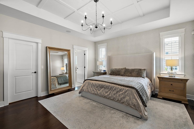 bedroom featuring an inviting chandelier, coffered ceiling, dark wood-type flooring, beamed ceiling, and baseboards