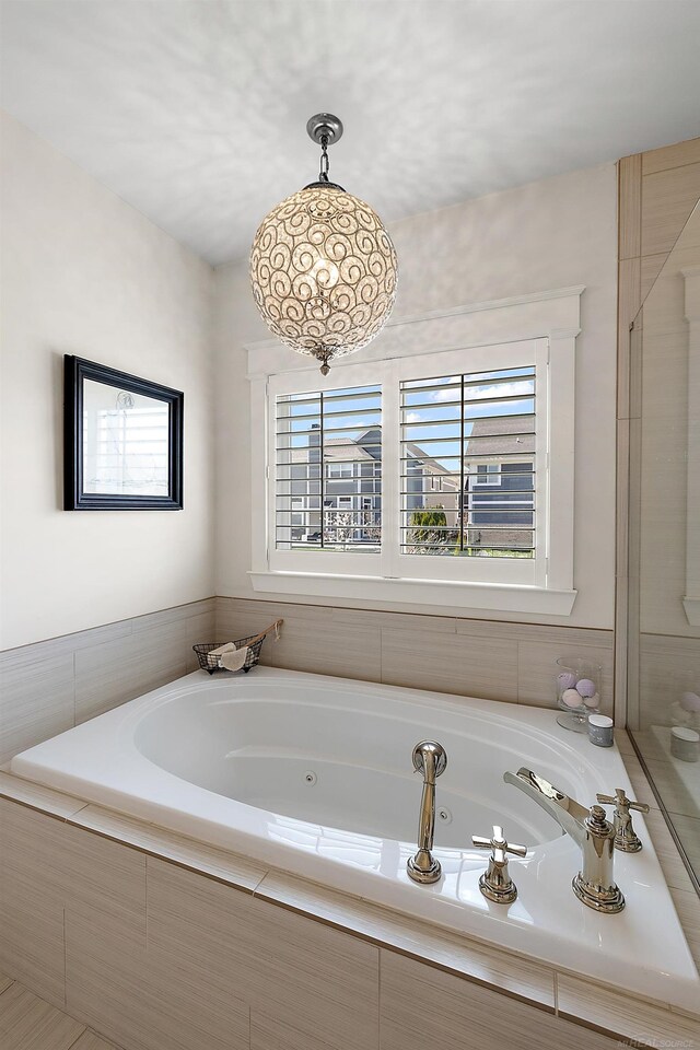 bathroom with a jetted tub