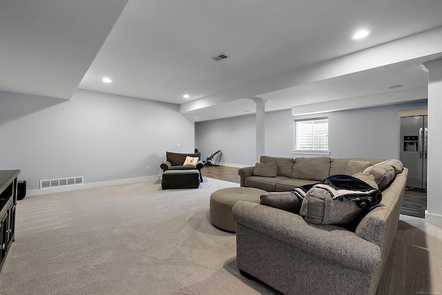 living room featuring recessed lighting, carpet floors, visible vents, and baseboards