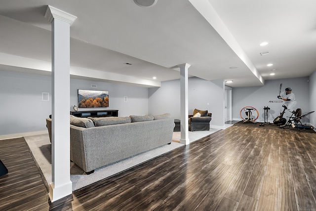 interior space featuring recessed lighting, wood finished floors, visible vents, and baseboards