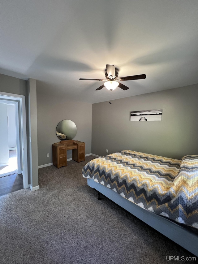 bedroom with carpet floors, a ceiling fan, and baseboards
