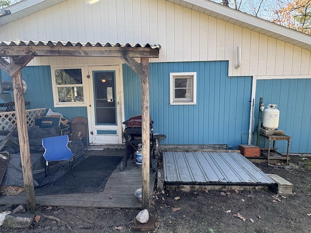 rear view of house featuring a deck