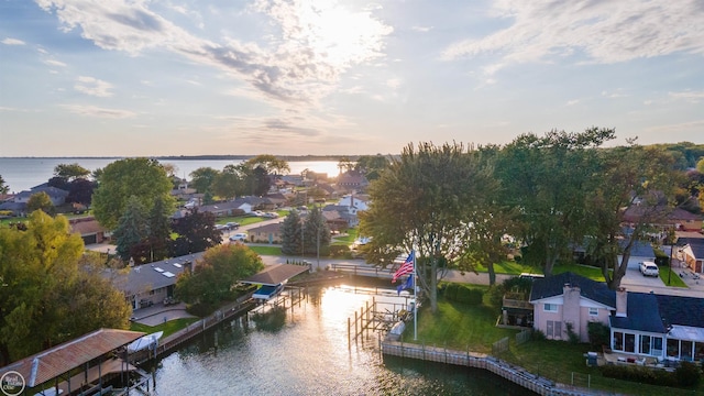 aerial view featuring a water view and a residential view