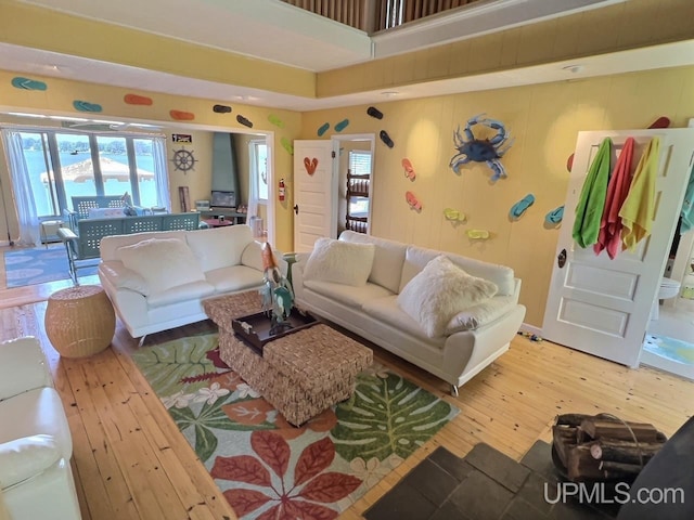 living area featuring hardwood / wood-style floors
