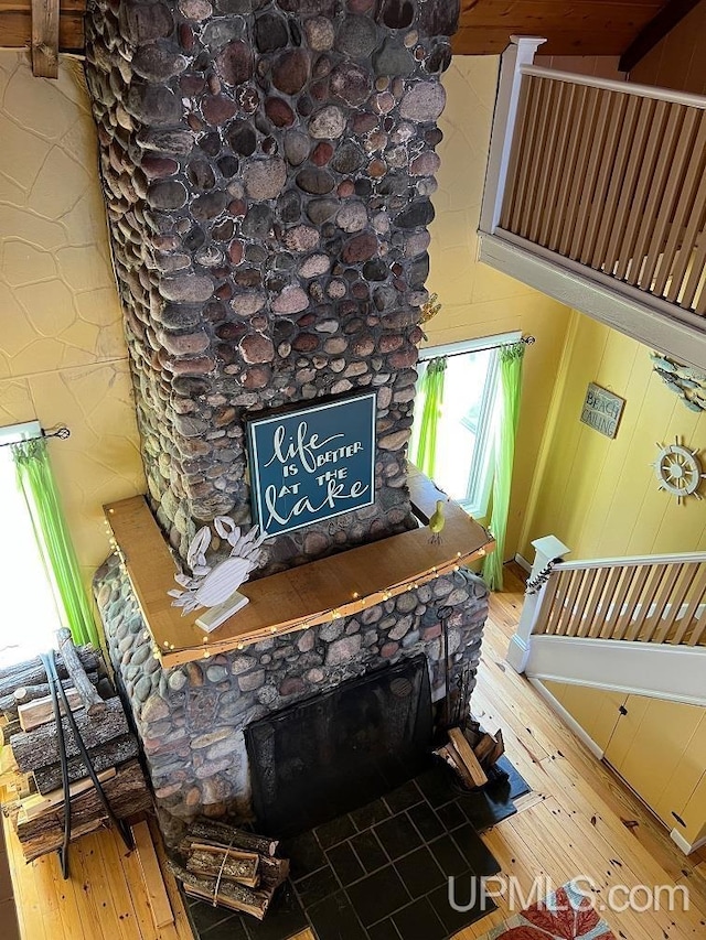 interior space featuring wood finished floors and a fireplace