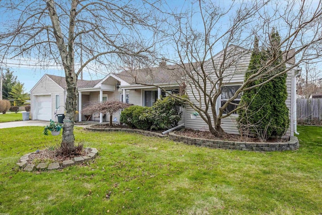 ranch-style home with a front lawn, driveway, a garage, and fence