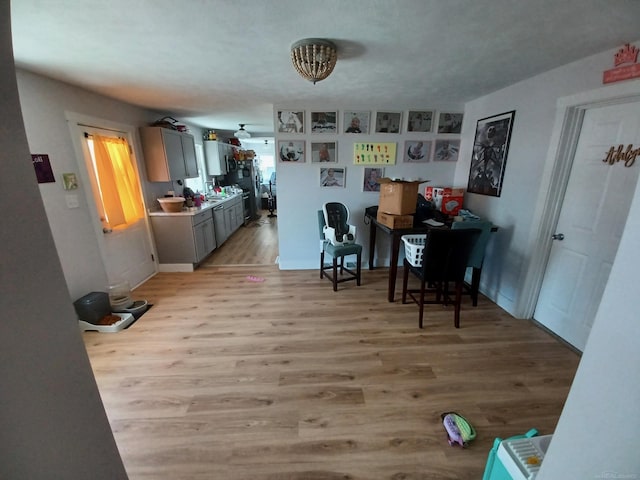 dining space with light wood-style floors