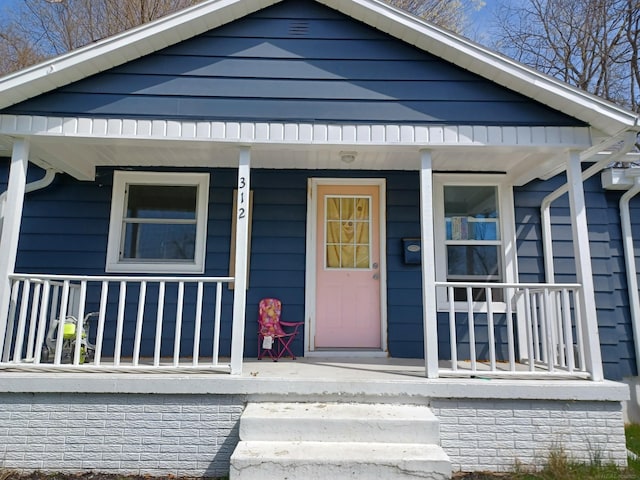 property entrance with a porch