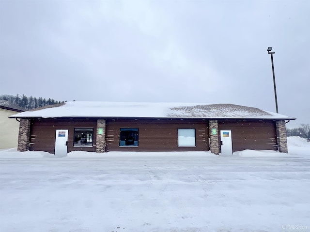 view of snow covered property