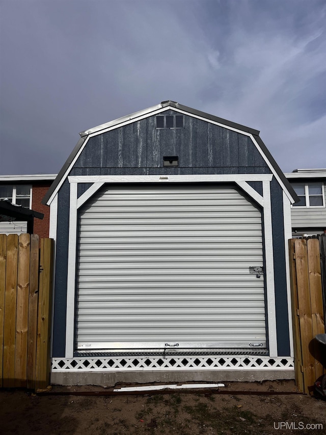 garage featuring fence
