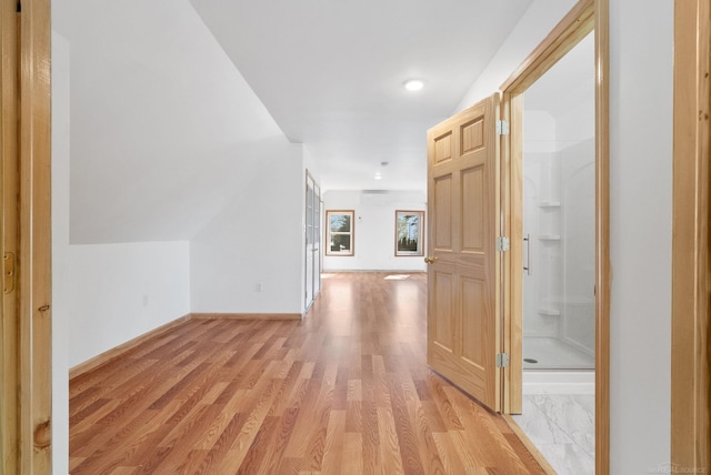 4358 Lakeshore Rd, Lexington, MI 48450 - corridor featuring baseboards, recessed lighting, and light wood finished floors
