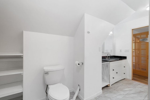 4358 Lakeshore Rd, Lexington, MI 48450 - bathroom featuring marble finish floor, toilet, vanity, baseboards, and lofted ceiling