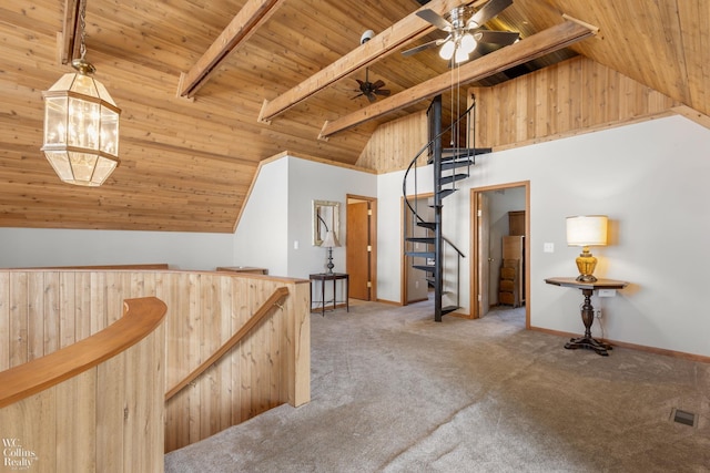 additional living space featuring wood ceiling, carpet, visible vents, and a ceiling fan
