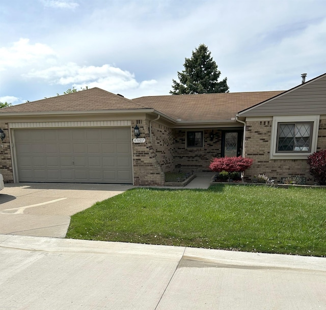 single story home featuring roof with shingles, an attached garage, a front lawn, brick siding, and driveway