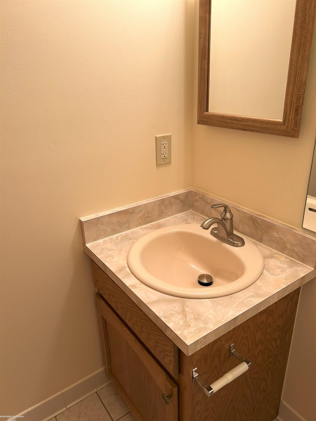bathroom featuring vanity and tile patterned flooring