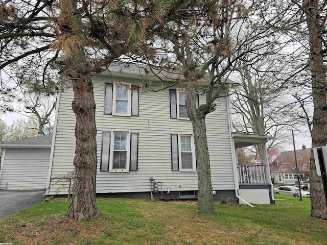 303 N 5th St, Saint Clair, MI 48079 - exterior space with a lawn and covered porch