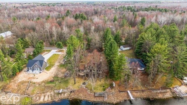 aerial view with a wooded view