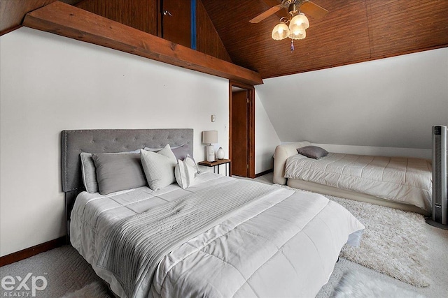 carpeted bedroom with a ceiling fan, wooden ceiling, vaulted ceiling, and baseboards