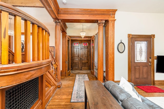 entryway with wood-type flooring