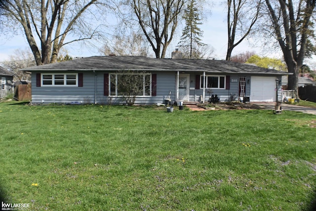 ranch-style home with driveway, a chimney, covered porch, an attached garage, and a front lawn