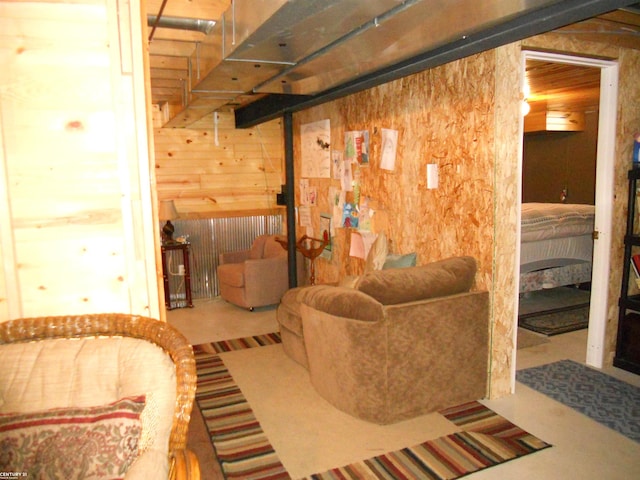 sitting room with wood walls