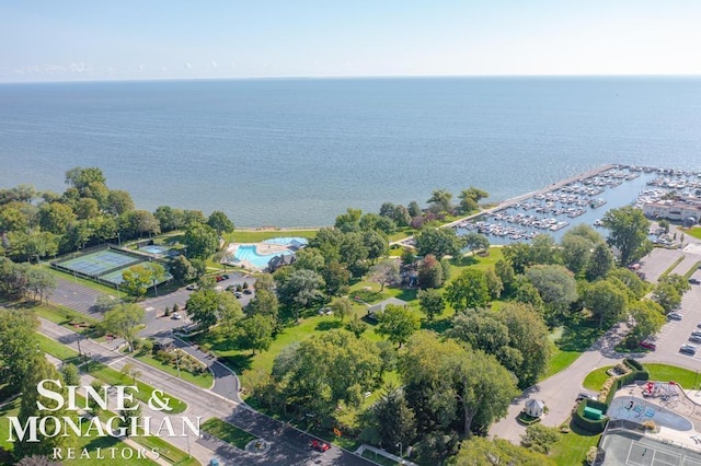 birds eye view of property featuring a water view