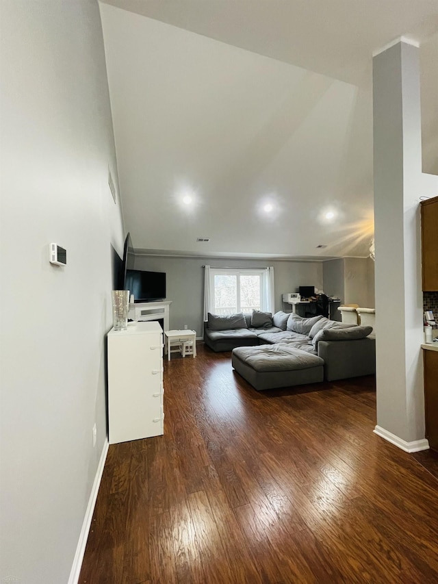 living room featuring wood finished floors, recessed lighting, and baseboards