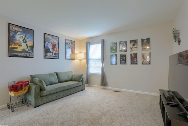 carpeted living room with baseboards and visible vents