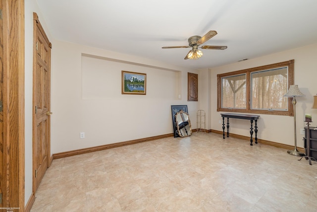 unfurnished living room with baseboards, light floors, visible vents, and ceiling fan