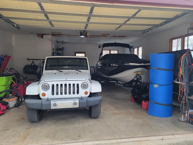 garage featuring a garage door opener
