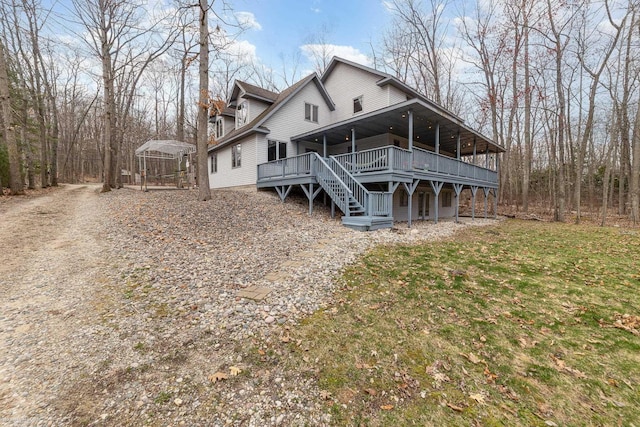 exterior space featuring a wooden deck
