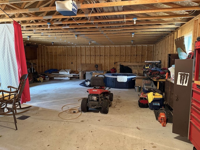 garage featuring a garage door opener