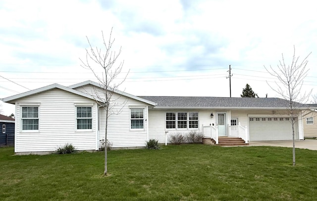 single story home with a front lawn, a garage, and concrete driveway