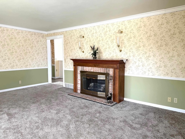 unfurnished living room featuring a fireplace, visible vents, ornamental molding, and carpet floors