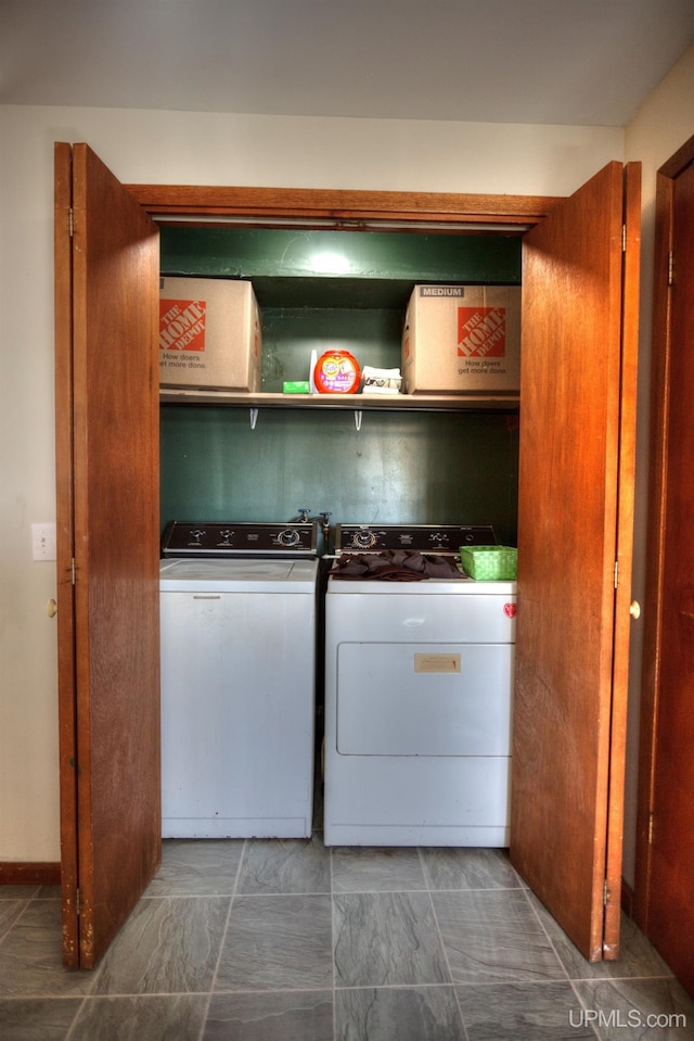 washroom with washer and dryer and laundry area