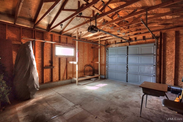 garage featuring a garage door opener