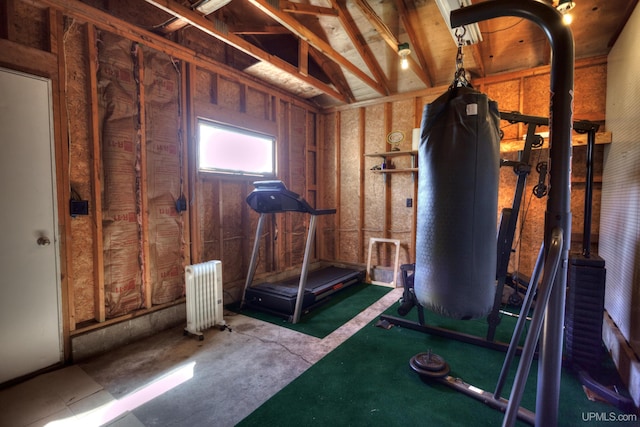 exercise area featuring radiator heating unit