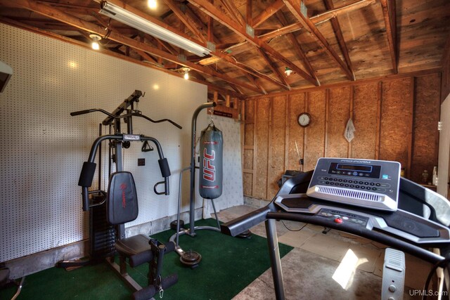 exercise area with lofted ceiling